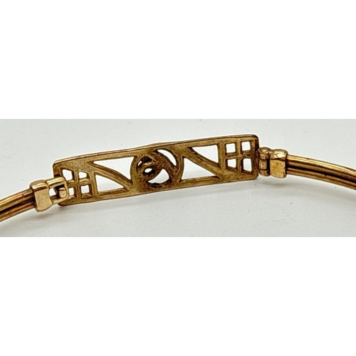 1059 - A 9ct gold Rennie Mackintosh design bangle with hook and eye clasp. Fully hallmarked inside bangle, ... 