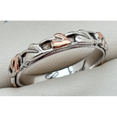 1067 - A 925 silver 4mm wide Tree Of Life band ring by Clogau with Welsh rose gold accent. Silver and gold ... 