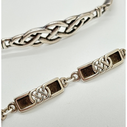 1069 - 3 items of silver Celtic design jewellery. A Celtic knot decorated 6 panel bracelet with lobster cla... 