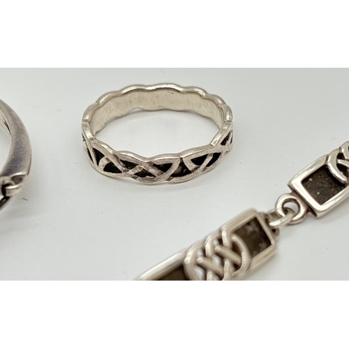 1069 - 3 items of silver Celtic design jewellery. A Celtic knot decorated 6 panel bracelet with lobster cla... 