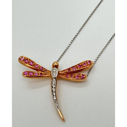 1101 - A boxed 18ct gold, pink sapphire and diamond set dragonfly pendant necklace. A rose gold dragonfly p... 