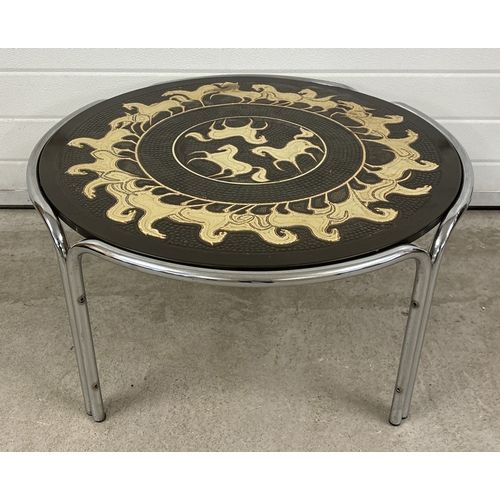 1477 - A retro mid century circular shaped coffee table with chrome legs and a resin covered hardboard top ... 