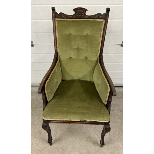 1488 - An antique dark wood framed ladies armchair with green velvet upholstery and carved detail.