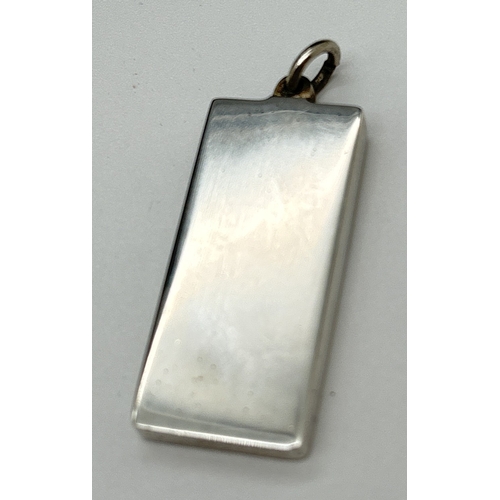 1103 - A vintage silver Jubilee ingot pendant with large hallmark detail to front, Sheffield 1977. Approx. ... 