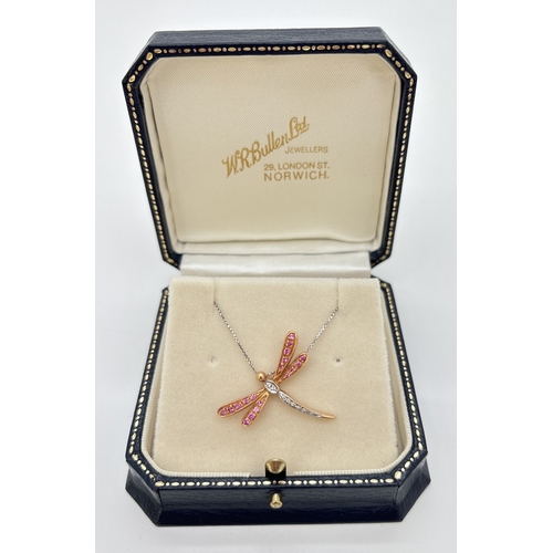 1101 - A boxed 18ct gold, pink sapphire and diamond set dragonfly pendant necklace. A rose gold dragonfly p... 