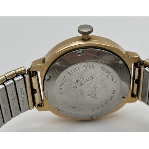 1133 - A vintage Cyma Synchron Conquistador automatic wristwatch with gold tone case and expanding bracelet... 