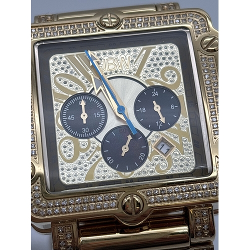 1138 - A men's Phantom chronograph diamond set wristwatch by JBW. Large square 18ct gold plated stainless s... 