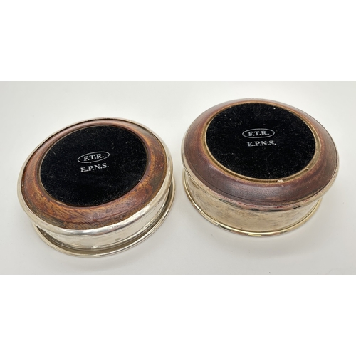 1172 - 2 modern silver plated coasters with wooden bases and black baize to underside. Tallest approx. 5cm ... 