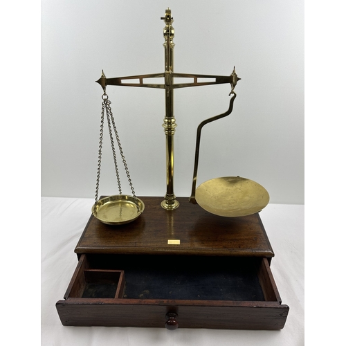 1180 - A large set of Victorian brass Avery Ltd travelling apothecary scales with mahogany case. With brass... 