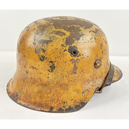 1212 - German Luftwaffe M42 steel helmet painted ochre over Luftwaffe blue, with the Luftwaffe branch of se... 