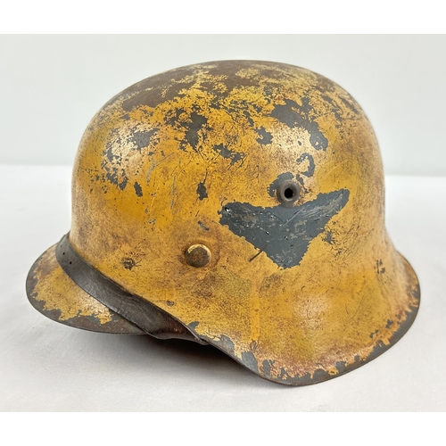 1212 - German Luftwaffe M42 steel helmet painted ochre over Luftwaffe blue, with the Luftwaffe branch of se... 