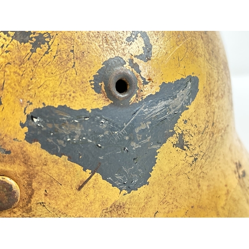 1212 - German Luftwaffe M42 steel helmet painted ochre over Luftwaffe blue, with the Luftwaffe branch of se... 