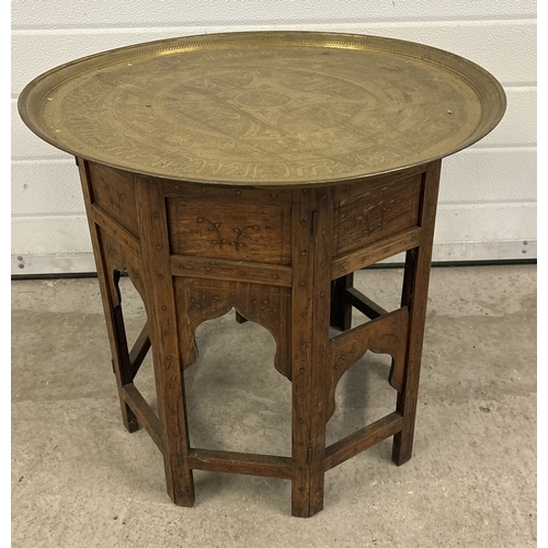 1274 - A 19th century brass inlaid octagonal occasional table with Persian brass tray top. Table base with ... 