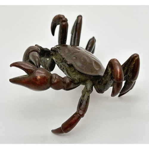 1286 - A small Japanese bronze modelled as a crab, with signature to underside of body. Approx. 3cm tall x ... 