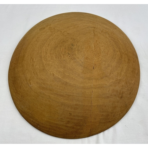 1291 - A large Malayan circular wooden dish for tin panning. Approx. 47cm diameter.