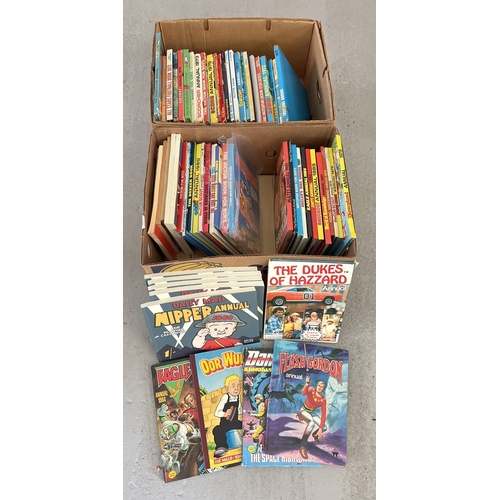 1309 - A collection of 50+ assorted vintage annuals dating from the 1970's & 80's together with comic books... 