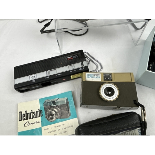 1335 - A collection of assorted vintage & more modern cameras & accessories. To include a cased Ilford Spri... 