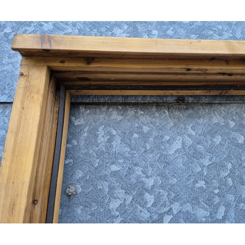 1415 - A wooden exterior door frame, in as new condition, with hardwood sill and fitted with draft excluder... 