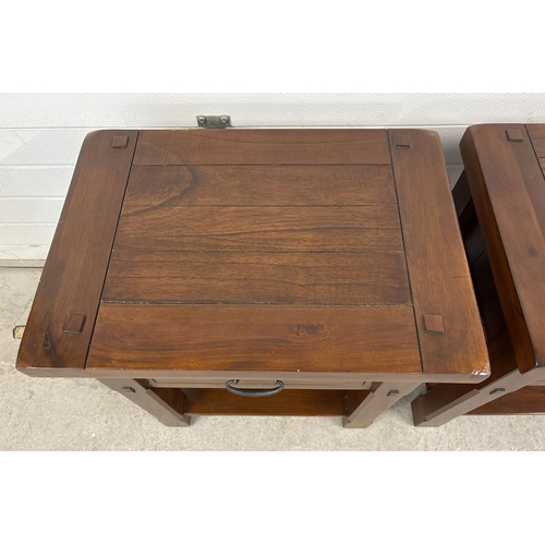 1461 - A pair of heavy solid mango wood 'Zocalo' side/lamp tables with central drawer and undershelf. Large... 