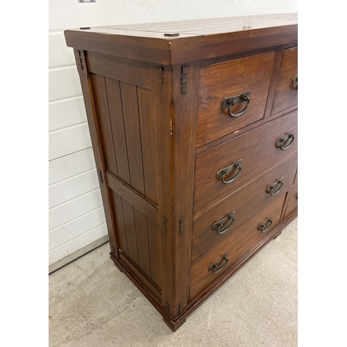 1465 - A large 'Zocalo' heavy solid mango wood 10 draw sideboard unit with heavy metal drop handles. Approx... 