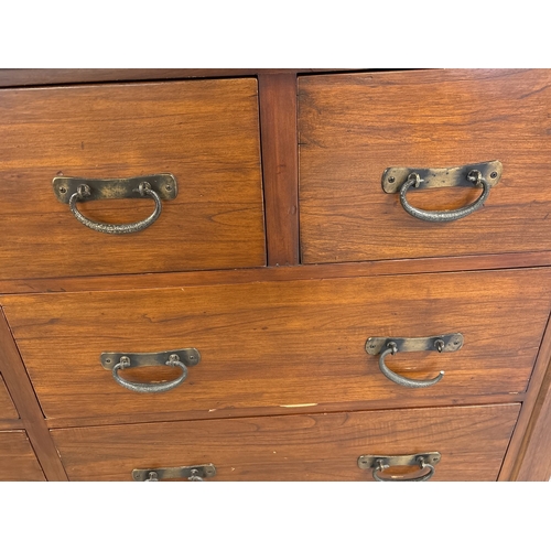 1465 - A large 'Zocalo' heavy solid mango wood 10 draw sideboard unit with heavy metal drop handles. Approx... 