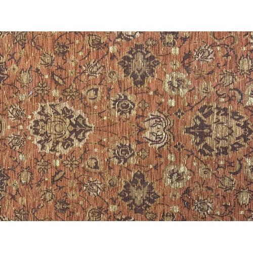 1474 - 2 modern rugs of floral design. Larger tassle ended salmon pink ground rug, approx. 185cm long x 125... 