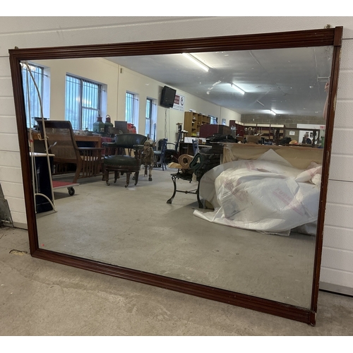 1491 - An early 20th century very large & heavy oak framed mirror with chanelled design frame. Approx. 173c... 