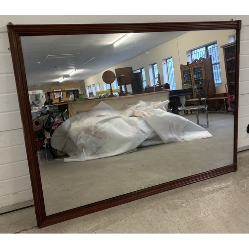 1491 - An early 20th century very large & heavy oak framed mirror with chanelled design frame. Approx. 173c... 