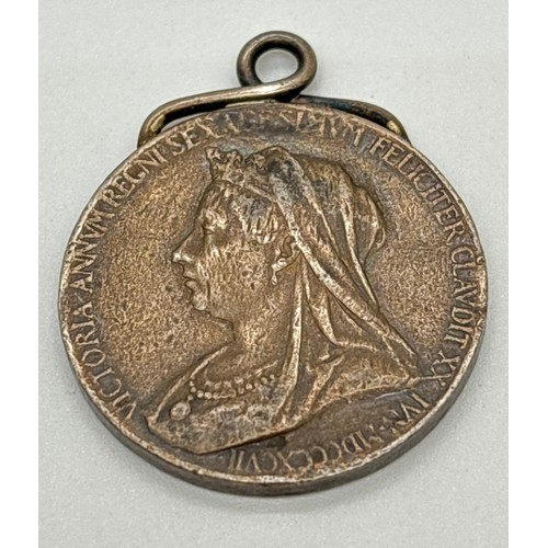 1186 - A silver Victoria 1897 Diamond Jubilee commemorative medallion with twisted design hanging bale fixe... 