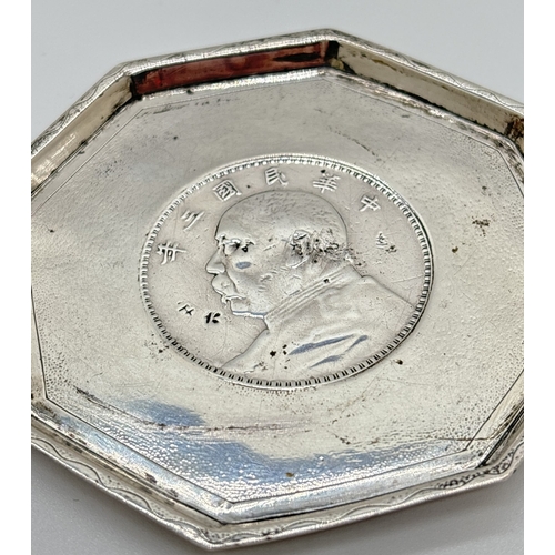 1184 - A Chinese silver octagonal shaped pin tray set with a Yuan Shih-kai or 