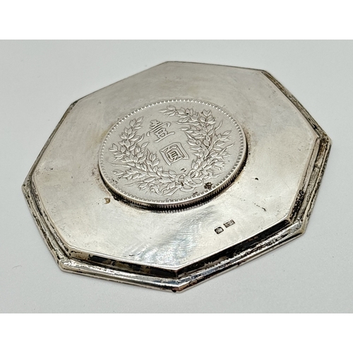 1184 - A Chinese silver octagonal shaped pin tray set with a Yuan Shih-kai or 