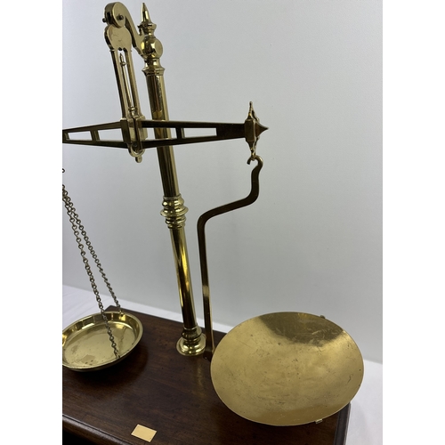 1195 - A large set of Victorian brass Avery Ltd travelling apothecary scales with mahogany case. With brass... 