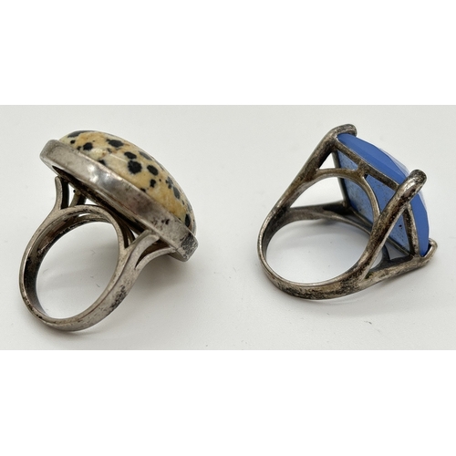 1021 - 2 white metal natural stone set modern design dress rings. One set with a square faceted blue chalce... 