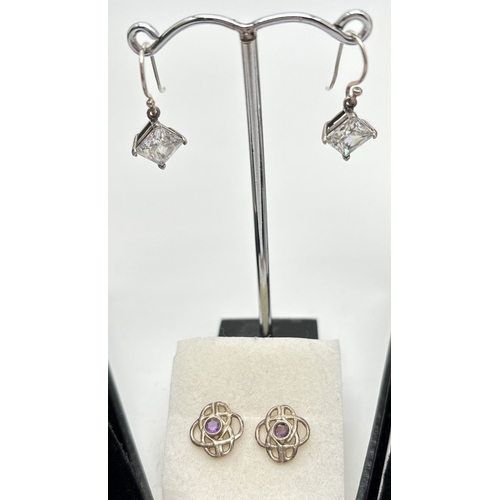 1023 - 4 pairs of of stud and drop style earrings. To include a pair of Celtic knot teardrop earrings, a pa... 