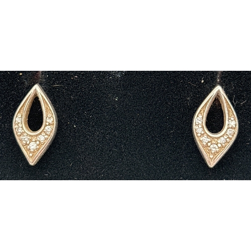 1023 - 4 pairs of of stud and drop style earrings. To include a pair of Celtic knot teardrop earrings, a pa... 