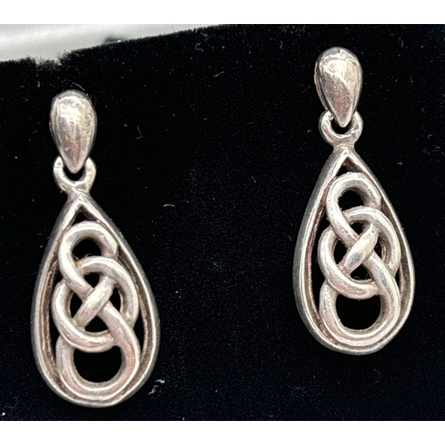 1023 - 4 pairs of of stud and drop style earrings. To include a pair of Celtic knot teardrop earrings, a pa... 