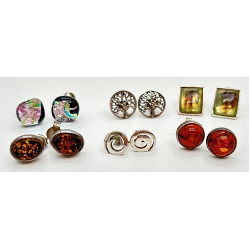 1080 - 6 pairs of silver & white metal stud style earrings. To include 2 pairs of cognac amber set studs, b... 