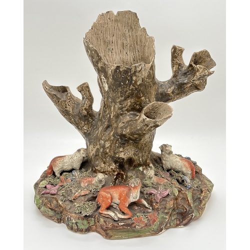 1227 - A 19th century large Staffordshire pottery animal figure group. Figures of 4 sheep and a deer sat wi... 