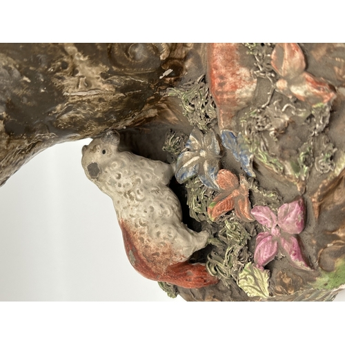 1227 - A 19th century large Staffordshire pottery animal figure group. Figures of 4 sheep and a deer sat wi... 