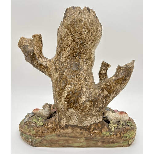 1227 - A 19th century large Staffordshire pottery animal figure group. Figures of 4 sheep and a deer sat wi... 