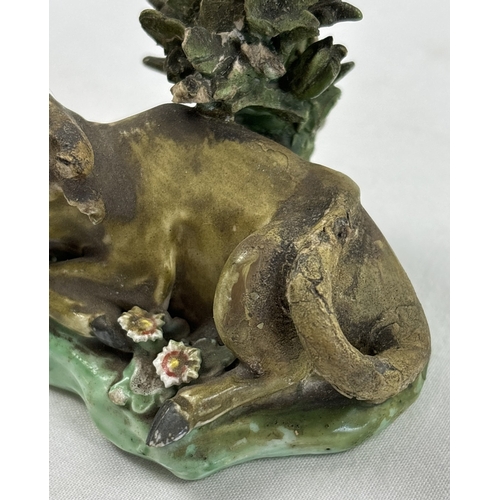 1236 - A collection of antique ceramic figures. To include Staffordshire Lion, Chelsea ginger and white cat... 