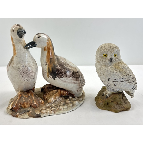 1238 - 2 ceramic bird figures. A pair of studio pottery ducks in brown colour way and a snowy owl figure. L... 