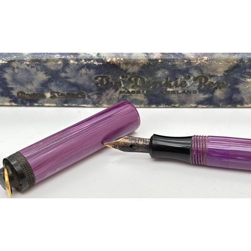 1187 - 2 boxed vintage 1930's lever filled fountain pens. The 'Nova' pen with blue marbled case and lid, na... 