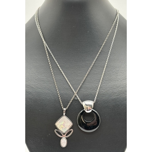 1048 - 2 modern design pendant necklaces. A drop pendant set with a square and oval of mother of pearl, on ... 