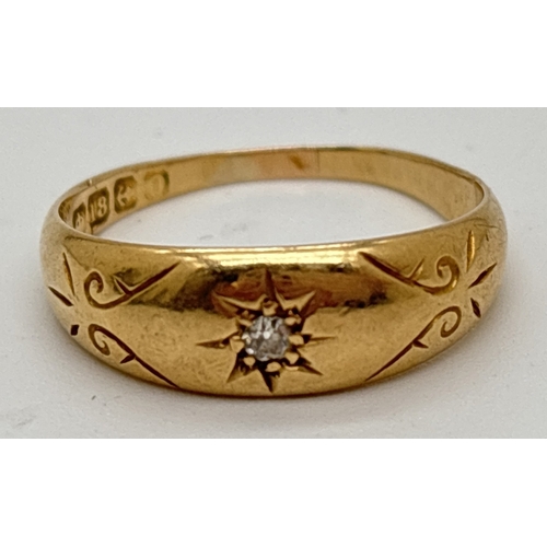 1062 - A vintage 18ct gold gypsy style band ring with engraved decoration and single round cut diamond. Ful... 