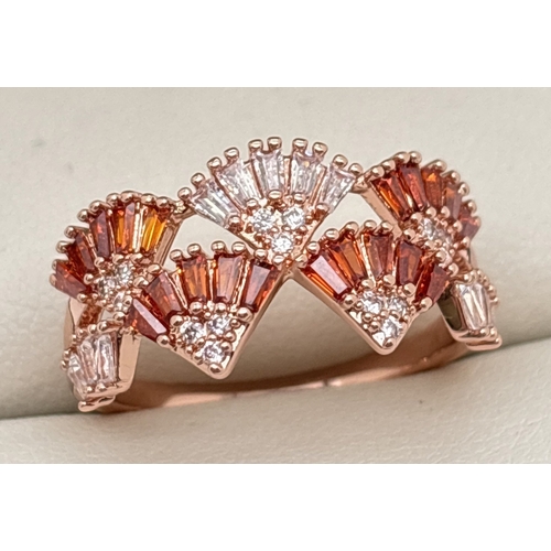 1096 - A rose gold plated Art Deco style fan design cocktail ring set with Swarovski crystals. Orange and c... 