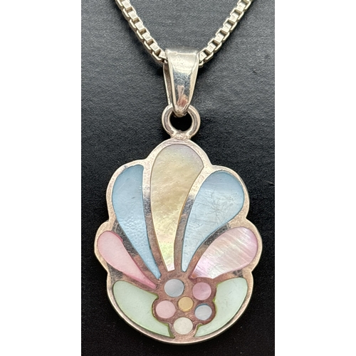 1124 - A modern style mother of pearl set pendant necklace. Pendant set with yellow, blue, green and pink m... 