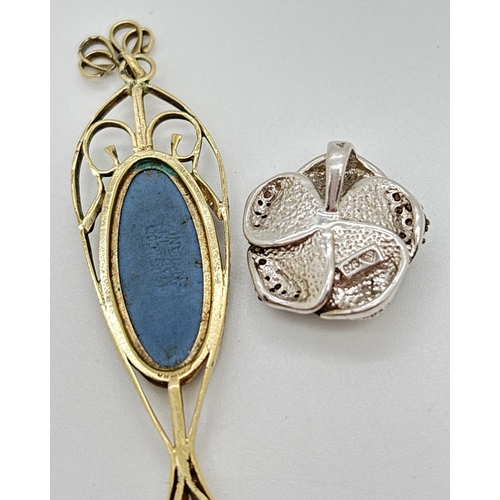 1135 - 2 silver pendants. A vintage silver gilt drop pendant set with a blue Wedgwood jasperware panel, tog... 