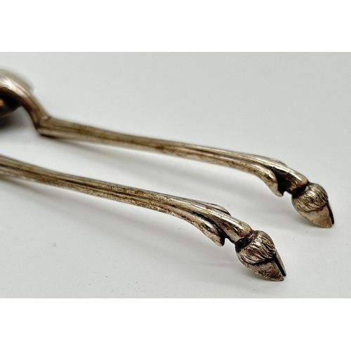 1169 - A pair of antique Art Nouveau style white metal teaspoons with deer hoof finials. Unmarked, possibly... 