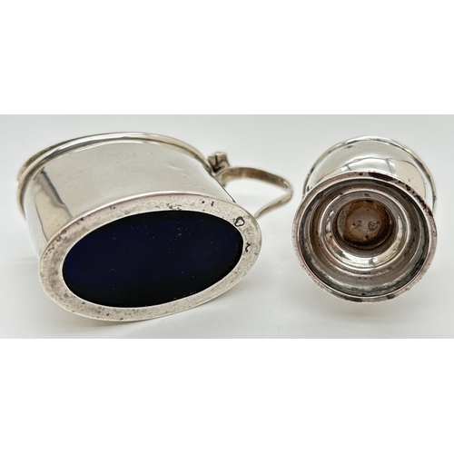 1177 - An Art Deco silver mustard pot and matching pepperette. An antique silver mustard pot of oval shape ... 